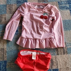 Girl swimsuit long sleeve size 5t.
